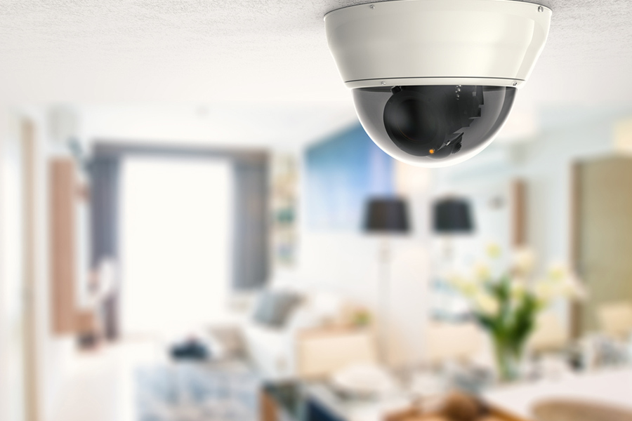 Up close shot of a home security ceiling camera